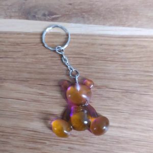 R/porte clés moyen ourson pattes rondes nuancé violet orange