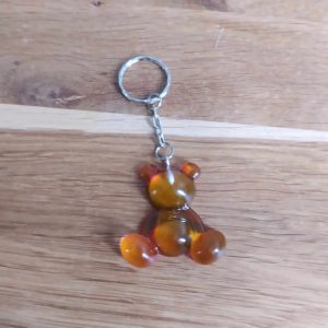 R/porte clés moyen ourson pattes rondes vert orange mauve