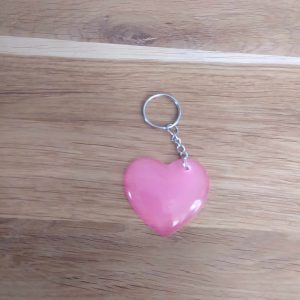 R/porte clés cœur rose transparent phosphorescent