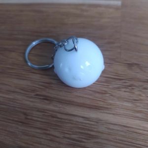 R/porte clés boule animaux poussin blanc