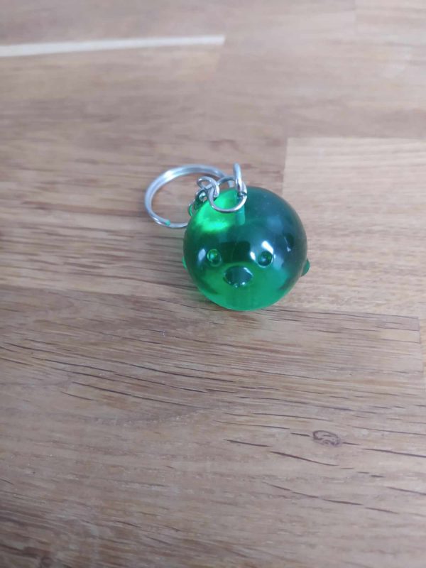 R/porte clés boule animaux poussin vert