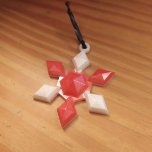 R/étoile forme losange rouge et blanc