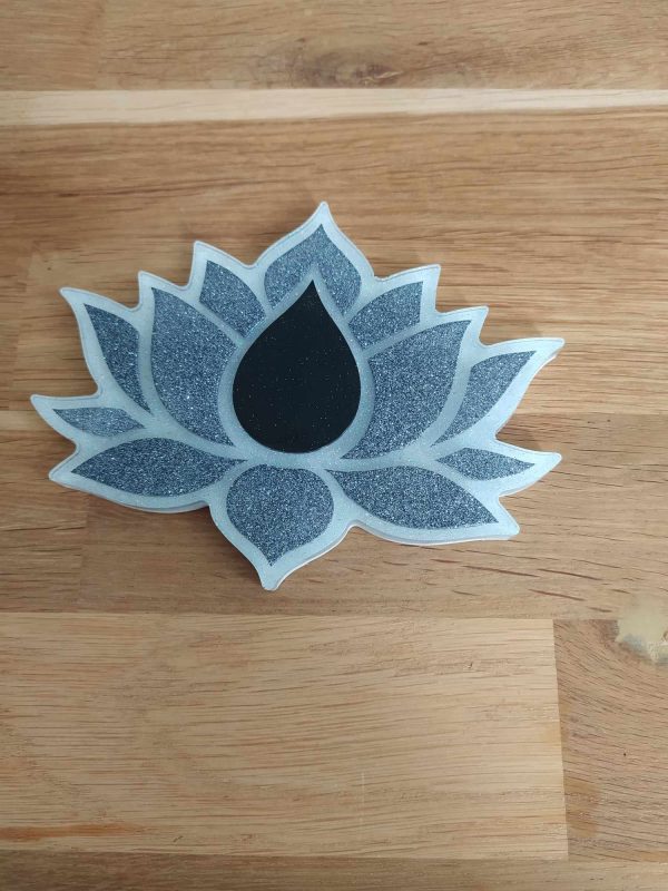 R/fleur de lotus à plat gris et noir pailleté