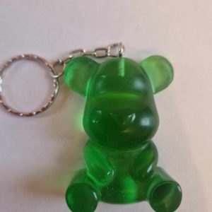 R/porte clés gros ourson assis cristal vert