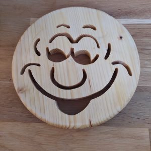 B/dessous de plat motif smiley en pin