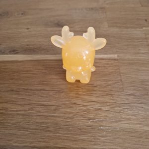 R/Figurine renne orange phosphorescent