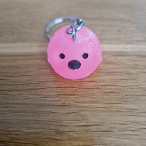 R/Porte clés boule animaux poussin rose fluo (traits dessinés)