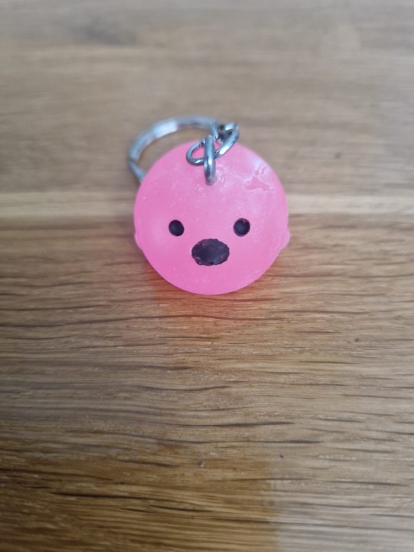R/Porte clés boule animaux poussin rose fluo (traits dessinés)