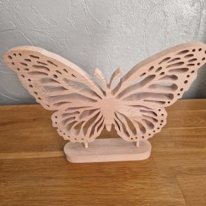 B/Papillon chantourné sur socle en hêtre