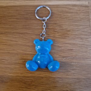 R/Porte clés moyen ourson pattes rondes bleu opaque