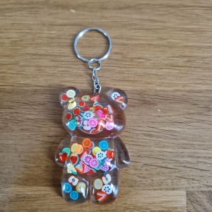 R/porte clés grand ourson debout fruits