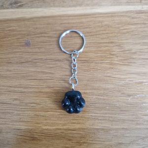 R/porte clés pattes de chat noir