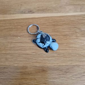 R/porte clés tortue noir et blanc