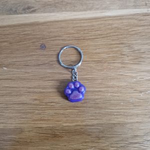 R/porte clés pattes de chat violet