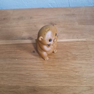 R/figurine loutre beige