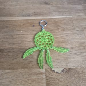 R/porte clés attrape rêves vert phosphorescent