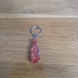 R/porte clés bouteille feuilles argent feuilles roses