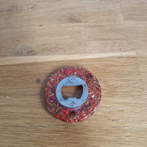 R/Décapsuleur forme ronde feuilles rouges feuilles or n° 6