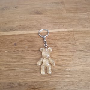R/porte clés ourson debout (Mr Bean) transparent or