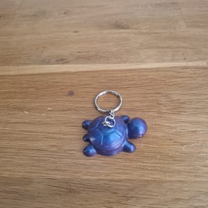 R/porte clés tortue violet bleu