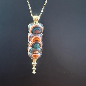 B/collier pendule tourné en bois multicolore (tube strié, orange, noir)